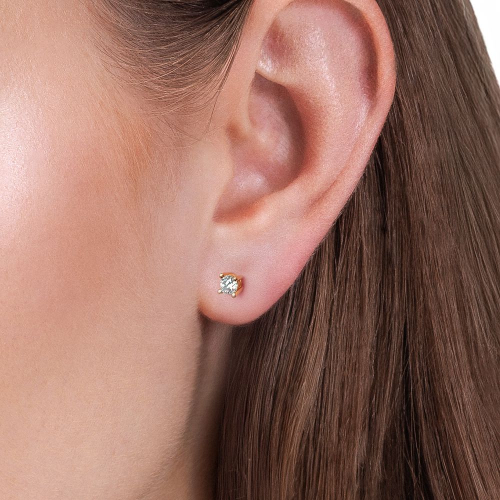  0.64 Karat Pırlanta Tektaş Küpe